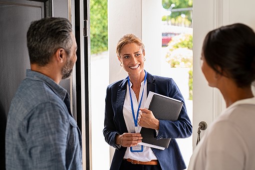 Advisor visiting home owners